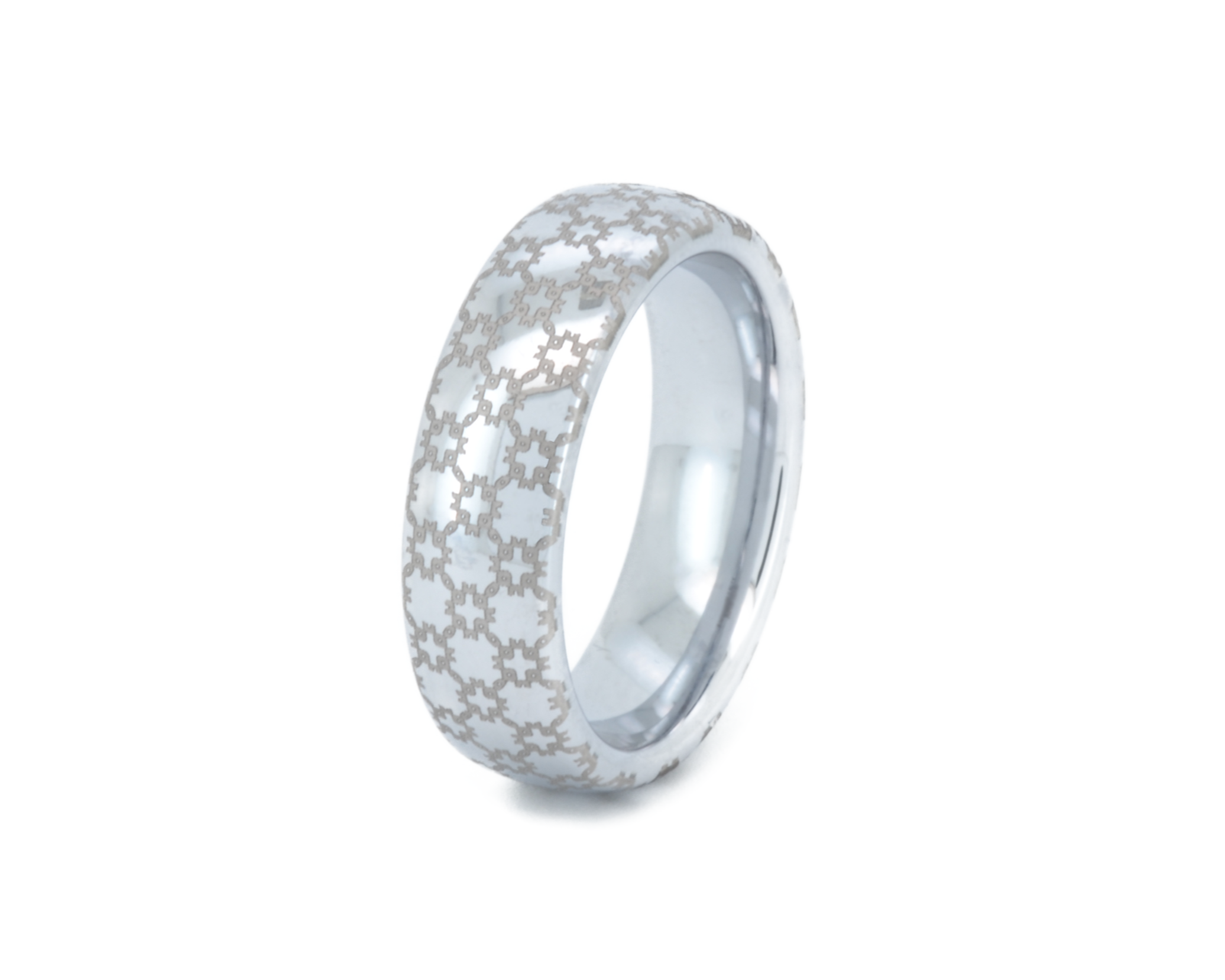 Silver ring with a textured pattern on a white background