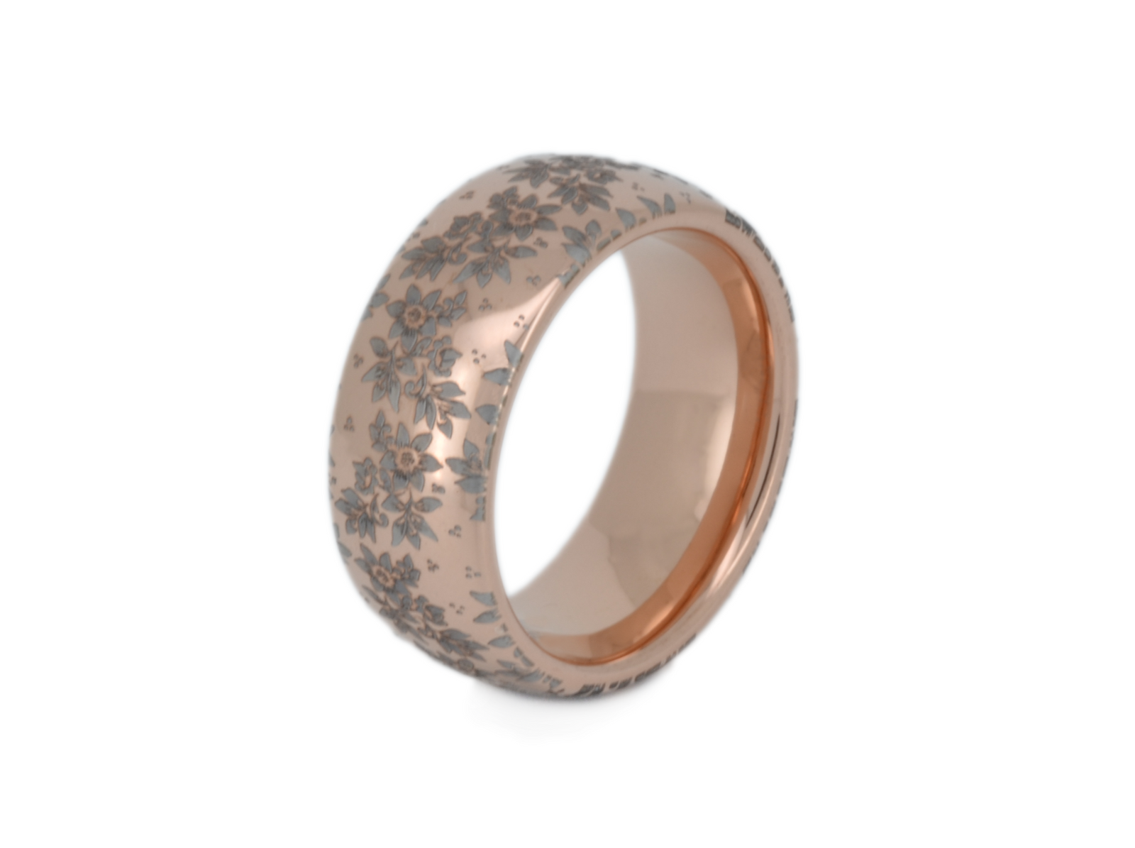 Blooming Grace tungsten ring with laser-engraved surface detail, shown against a light background.