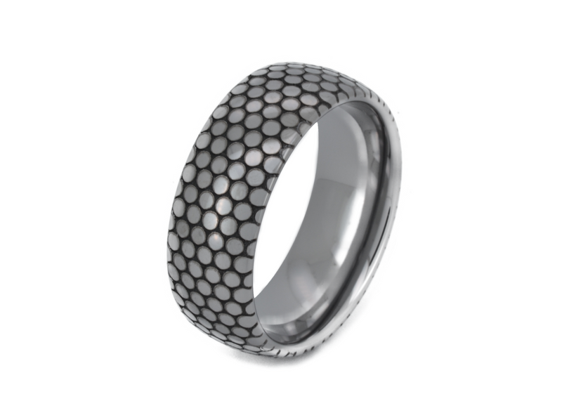 Eclipse Harmony Ring with laser-engraved surface detail, shown against a light background.