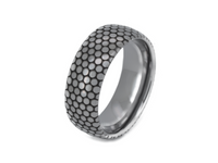 Eclipse Harmony Ring with laser-engraved surface detail, shown against a light background.