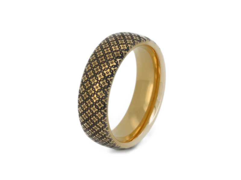 The Vintage Chic tungsten ring with laser-engraved surface detail, shown against a light background.