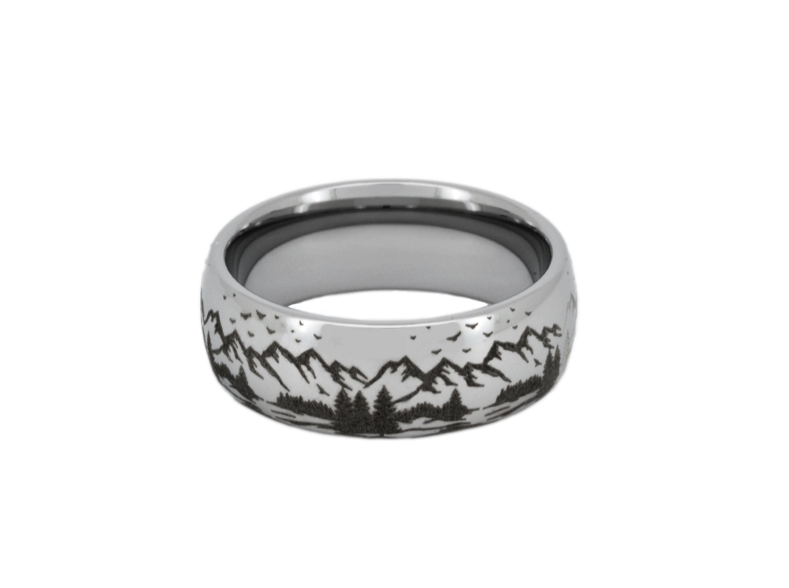 Silver tungsten ring with an engraved mountain range design, isolated on a white background.