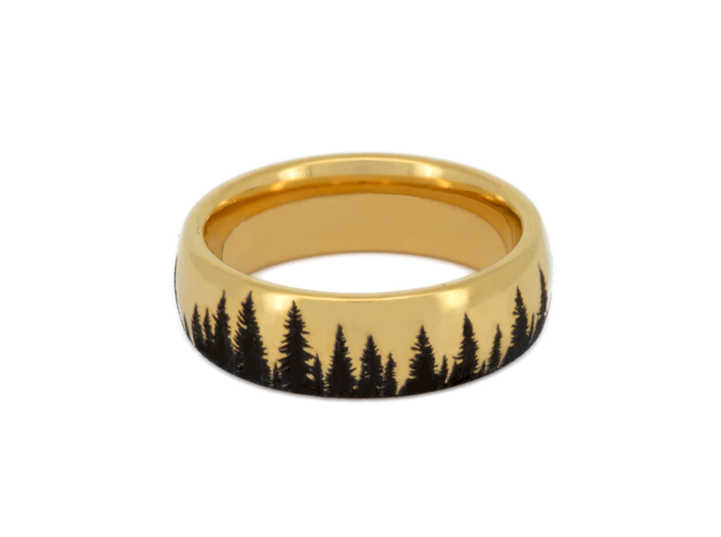 Gold tungsten ring with an engraved silhouette of an evergreen forest, isolated on a white background.