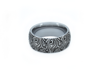 Product photo of the White Gold Mokume Majesty tungsten ring with laser-engraved surface detail.