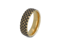 The Regal Weave tungsten ring with laser-engraved surface detail, shown against a light background.