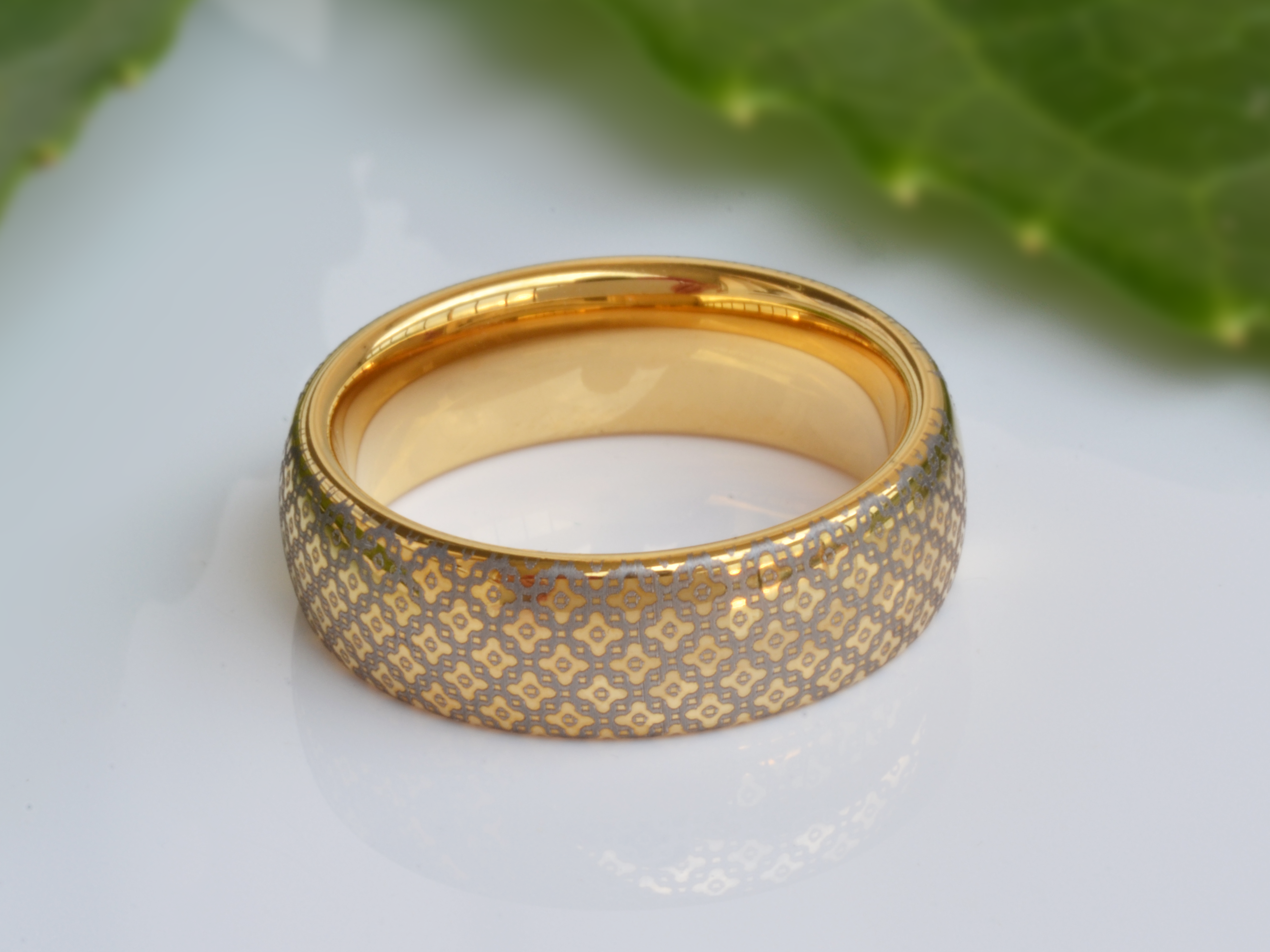 Luxury Gold tungsten ring with a timeless diamond pattern and a shiny finish, featuring an elegant design.