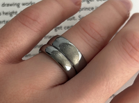 Couples Eternal Fingerprint Set personalized ring with personalized imprint engraving, worn on a hand.
