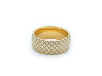 Product photo of the Golden Quilted Elegance tungsten ring with laser-engraved surface detail.