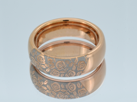 Product photo of the White Blooming Rose tungsten ring with laser-engraved surface detail.
