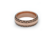 Product photo of the Eternal Love Band with laser-engraved surface detail.
