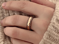 Eternal Love Band with laser-engraved surface detail, worn on a hand.