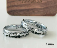 Product photo of the Mountains tungsten ring with laser-engraved surface detail.