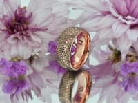 Product photo of the Boho Floral Mandala tungsten ring with laser-engraved surface detail.