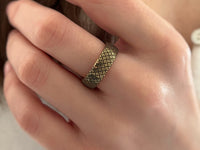 The Vintage Chic tungsten ring with laser-engraved surface detail, worn on a hand.