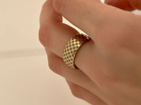 Royal Harmony tungsten ring with laser-engraved surface detail, worn on a hand.