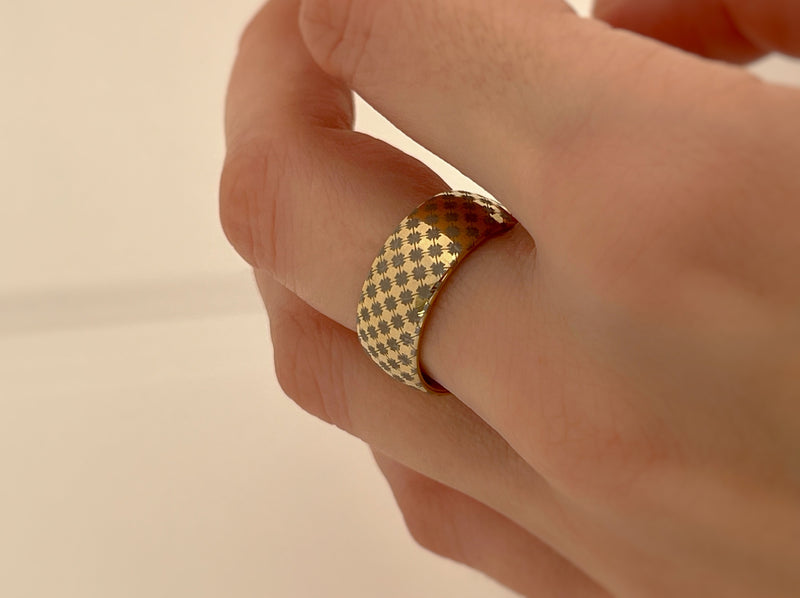 Royal Harmony tungsten ring with laser-engraved surface detail, worn on a hand.