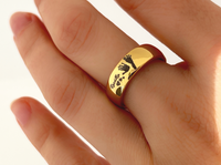 Eternal Imprint personalized ring with personalized imprint engraving, worn on a hand.