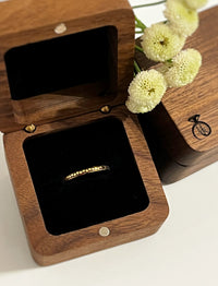 Product photo of the Eternal Love Band with laser-engraved surface detail.