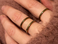 Eternal Love Band with laser-engraved surface detail, worn on a hand.
