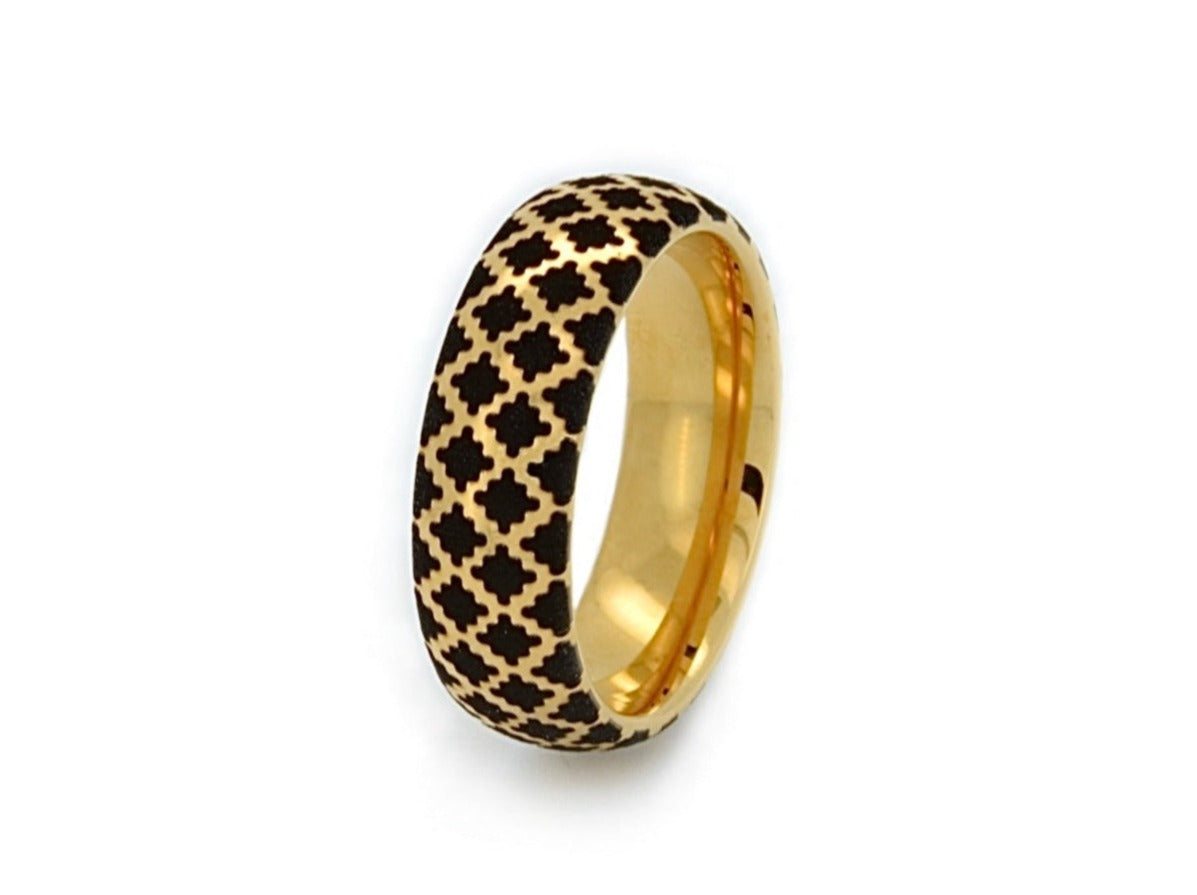 Golden Black Quilted Elegance tungsten ring with laser-engraved surface detail, shown against a light background.