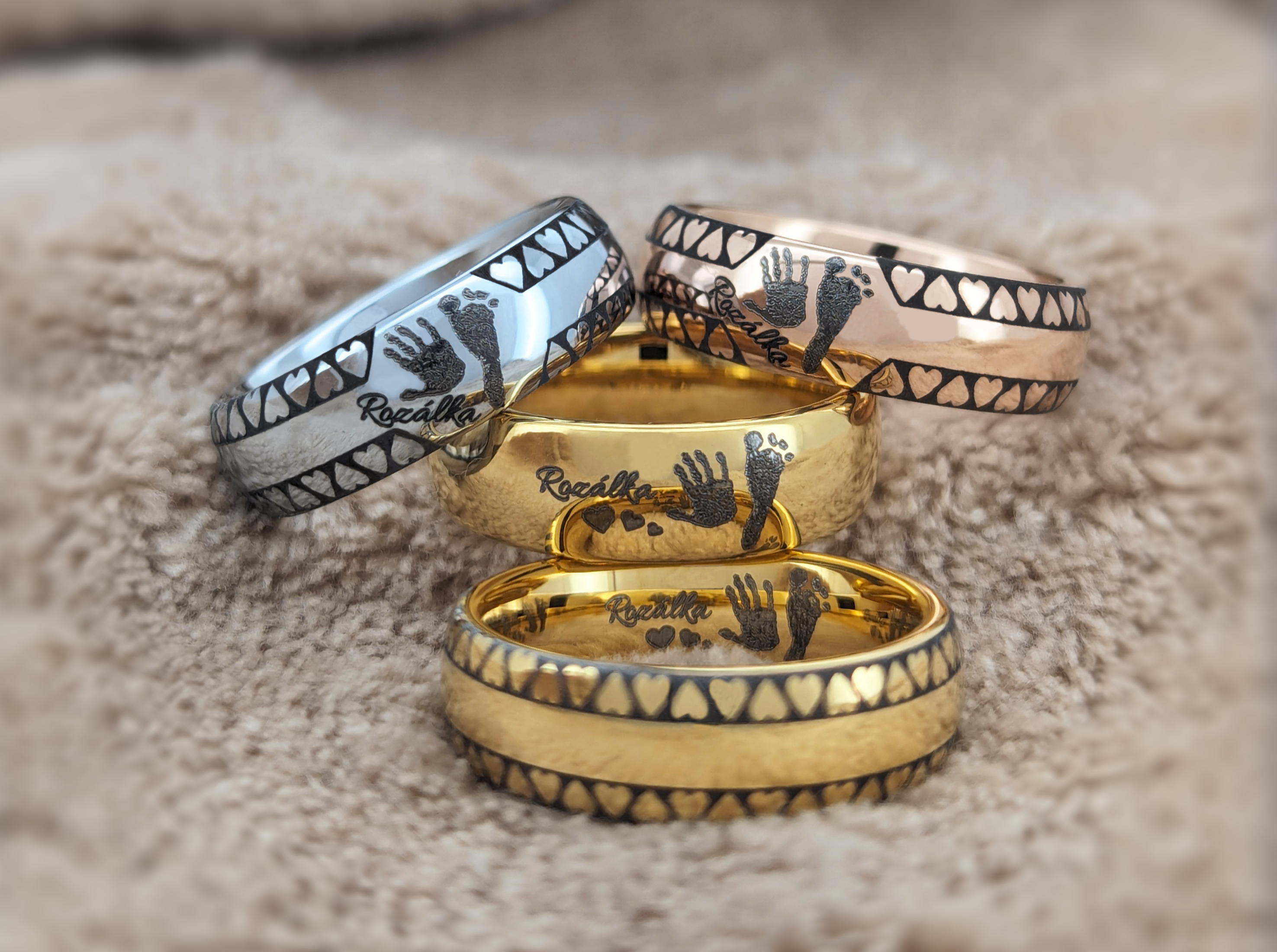 gold plated tungsten rings with a baby footprint or handprint and baby name as a special gift for mothers day.