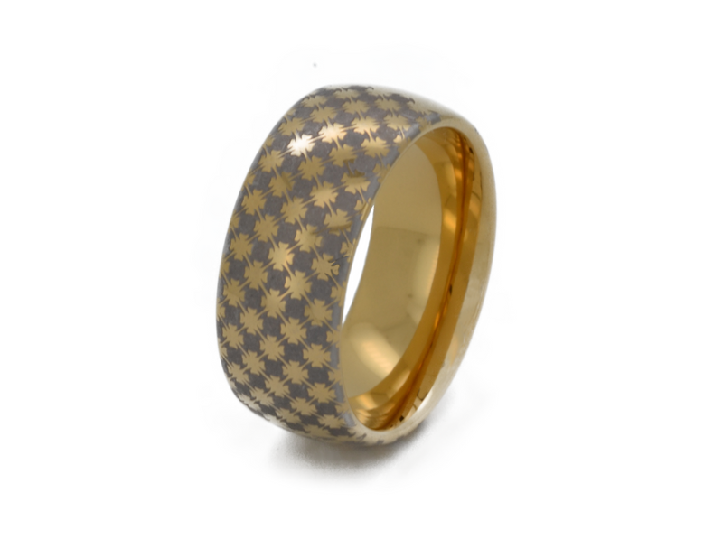 Astral Glow tungsten ring with laser-engraved surface detail, shown against a light background.