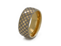 Astral Glow tungsten ring with laser-engraved surface detail, shown against a light background.