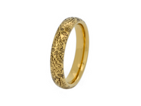 Delicate Oak Leaf tungsten ring with laser-engraved surface detail, shown against a light background.