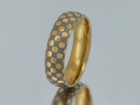 Product photo of the Golden Mosaic tungsten ring with laser-engraved surface detail.