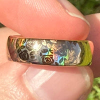 Product photo of the Holographic Roses tungsten ring with a laser-created holographic surface effect.