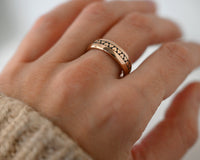 Eternal Heart Band with laser-engraved surface detail, worn on a hand.