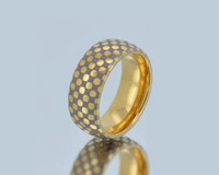 Product photo of the Celestial Grid tungsten ring with laser-engraved surface detail.