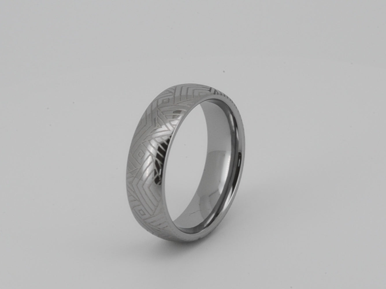 Unique geometric-patterned band, unisex design for her or him, perfect as a wedding, anniversary, or birthday gift. Fashionable and modern, crafted white gold-plated tungsten. Distinctive and elegant jewelry. Durable suitable for everyday wear.