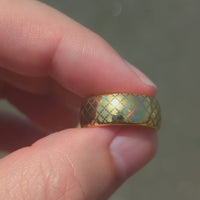 Video preview of the Quilted Grace tungsten ring showing the holographic effect shifting in the light.