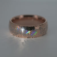 Video preview of the Blooming Light tungsten ring showing the holographic effect shifting in the light.