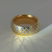 Video preview of the Quilted Grace tungsten ring showing the holographic effect shifting in the light.