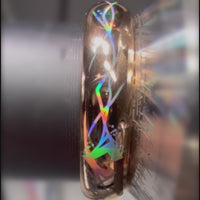 Close-up video of a Heartline ring on a metal holder, showing rainbow reflections across its angular heart motif.