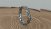 Video preview of the Silver Blooming Rose tungsten ring showing the surface detail as the item moves.