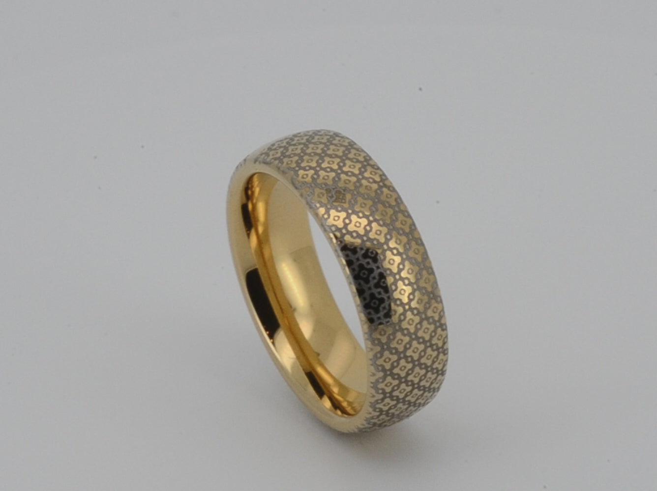 Gold wedding tungsten ring with a timeless diamond pattern and a shiny finish, featuring an elegant design.