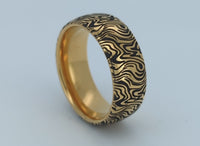 Video preview of the Golden Mokume Majesty tungsten ring showing the surface detail as the item moves.