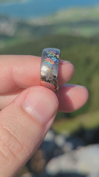 Video preview of the Blooming Light tungsten ring showing the holographic effect shifting in the light.