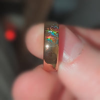 Video preview of the Holographic Roses tungsten ring showing the holographic effect shifting in the light.