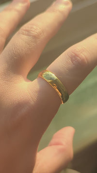 Video preview of the Holographic Inscription tungsten ring showing the holographic effect shifting in the light.