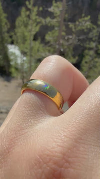 Video preview of the Holographic Inscription tungsten ring showing the holographic effect shifting in the light.