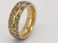 Video preview of the Delicate Oak Leaf tungsten ring showing the surface detail as the item moves.