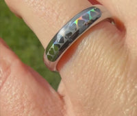 Video preview of the HoloHearts tungsten ring showing the holographic effect shifting in the light.