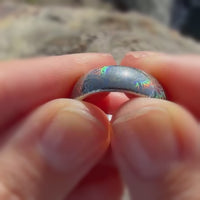 Video preview of the Glowing Reverie tungsten ring showing the holographic effect shifting in the light.