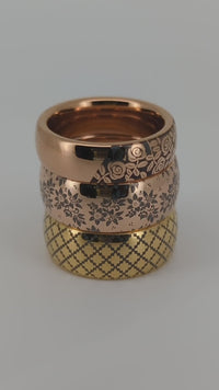 Video preview of holographic tungsten rings showing laser-created effects shifting in the light.