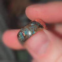 Video preview of the Blooming Light tungsten ring showing the holographic effect shifting in the light.